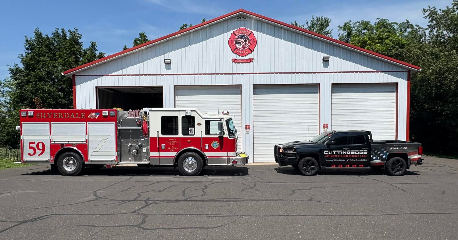 Silverdale Fire Company Engine 59 parked next to the CuttingEdge service truck outside the station